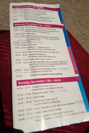 Ein Programmheft vom Symposium "Take Care". An einigen Stellen ist von Hand "Mikro" darauf geschrieben.